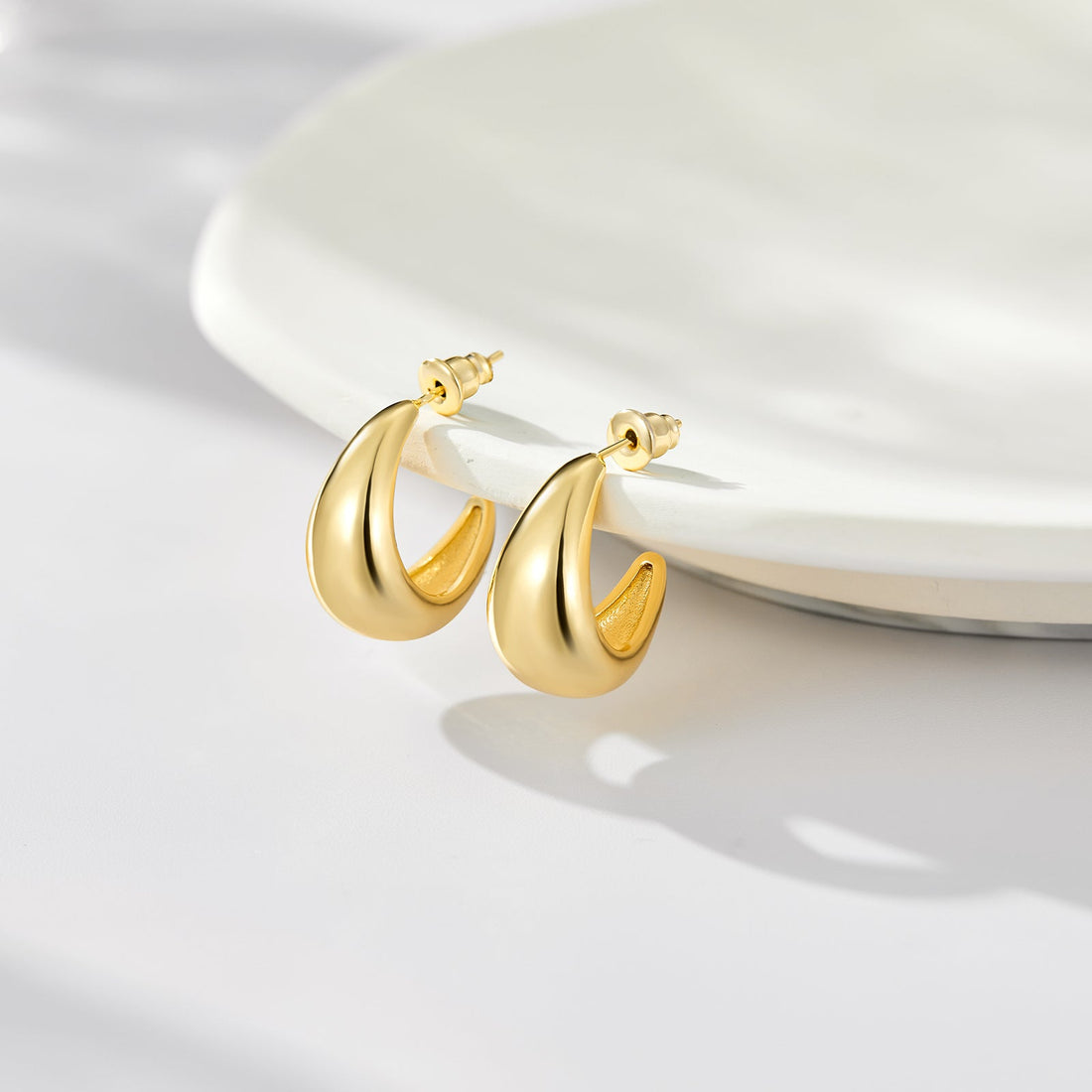 The Classiness of Gold Hoop Earrings: Versatile and Professional