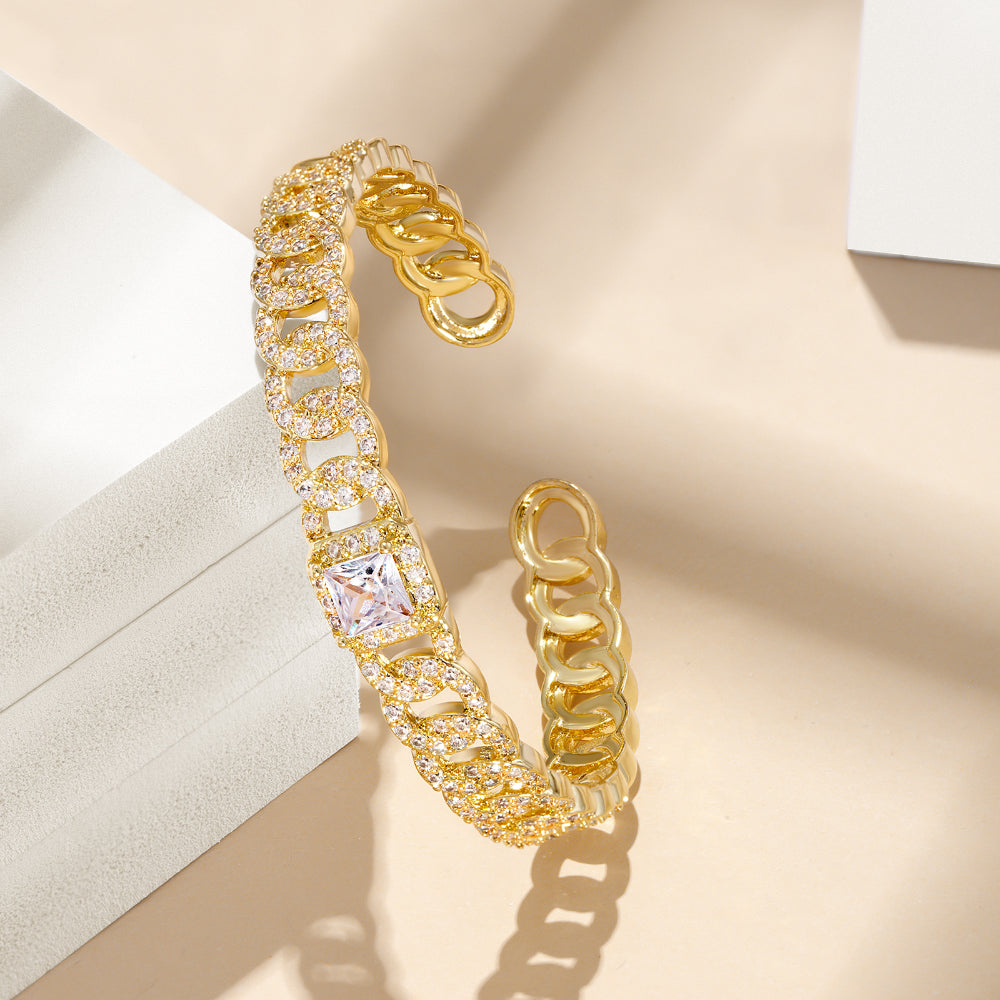 Close-up of Zircon Stones on 14K Gold Bangle