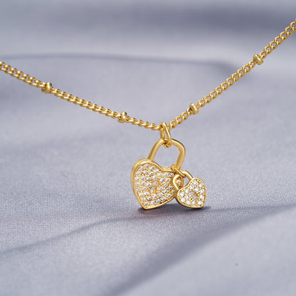 Close-up of Heart Lock Charm on 14k Gold Plated Anklet