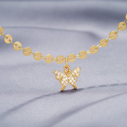 Close-up of Butterfly Charm on 14k Gold Plated Anklet