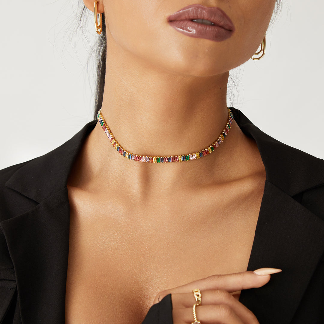 Close-up of Rainbow Baguette CZ in 14K Gold Diamond Tennis Necklace