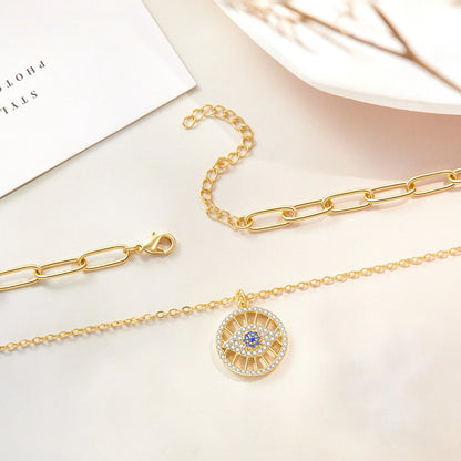 Elegant 14K Gold Layered Evil Eye Necklace with Round Pendant and Paperclip Chain